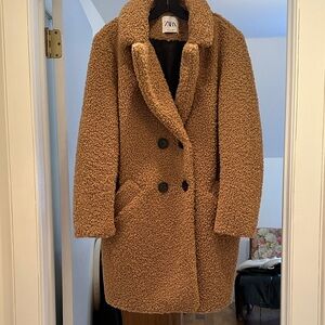 Zara Teddy coat 3/4 length car coat length
Tan color size medium